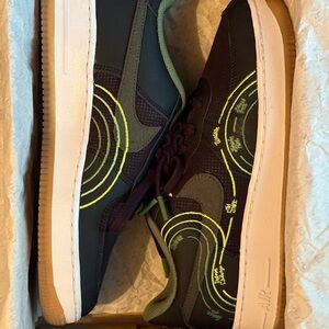 Black Sneakers with Green and Neon Yellow Accents